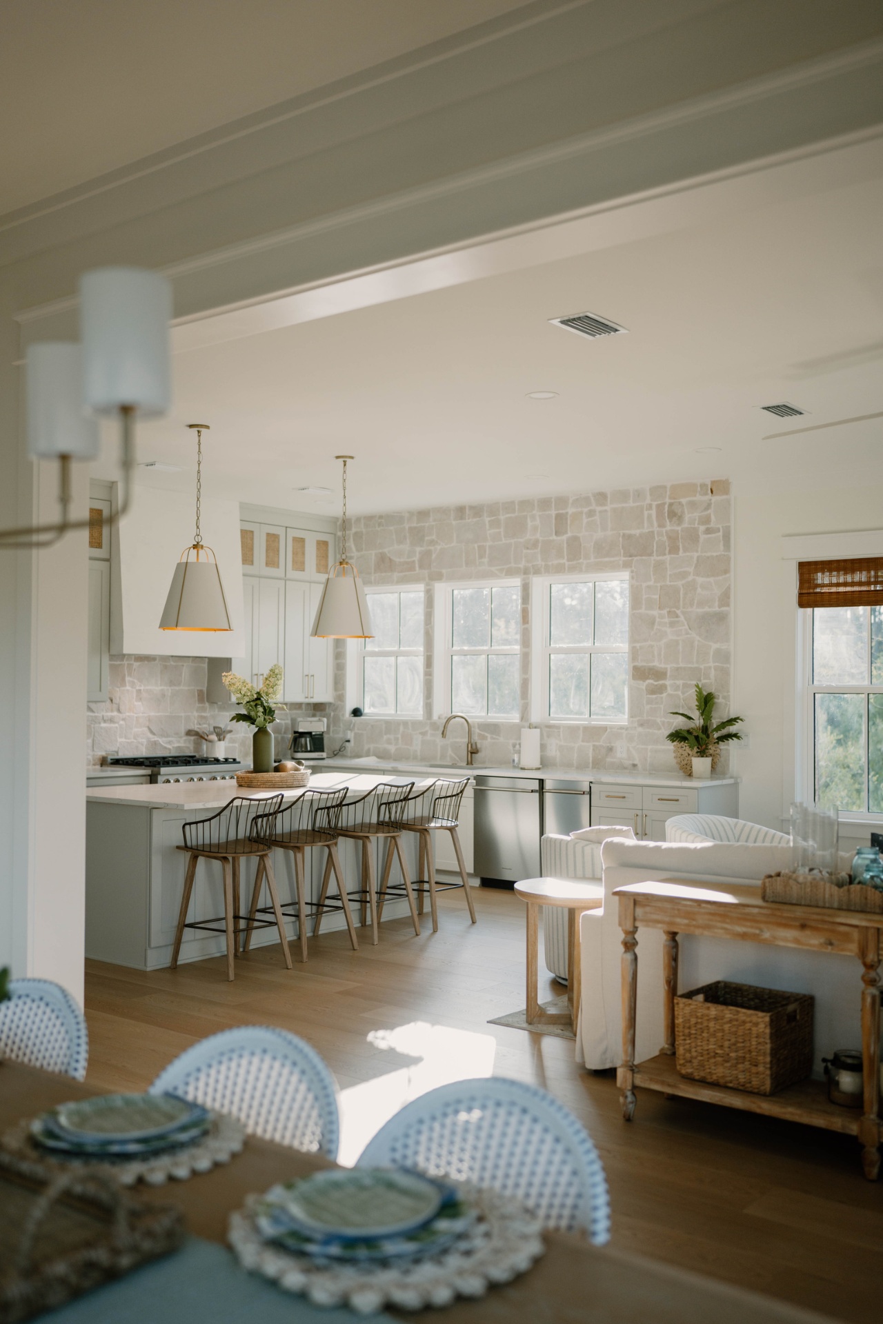 Kitchen and dining great room with pendant lights