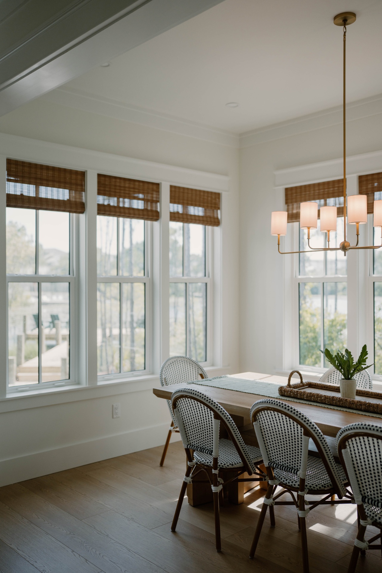 Dining room with bistro chairs and lake views